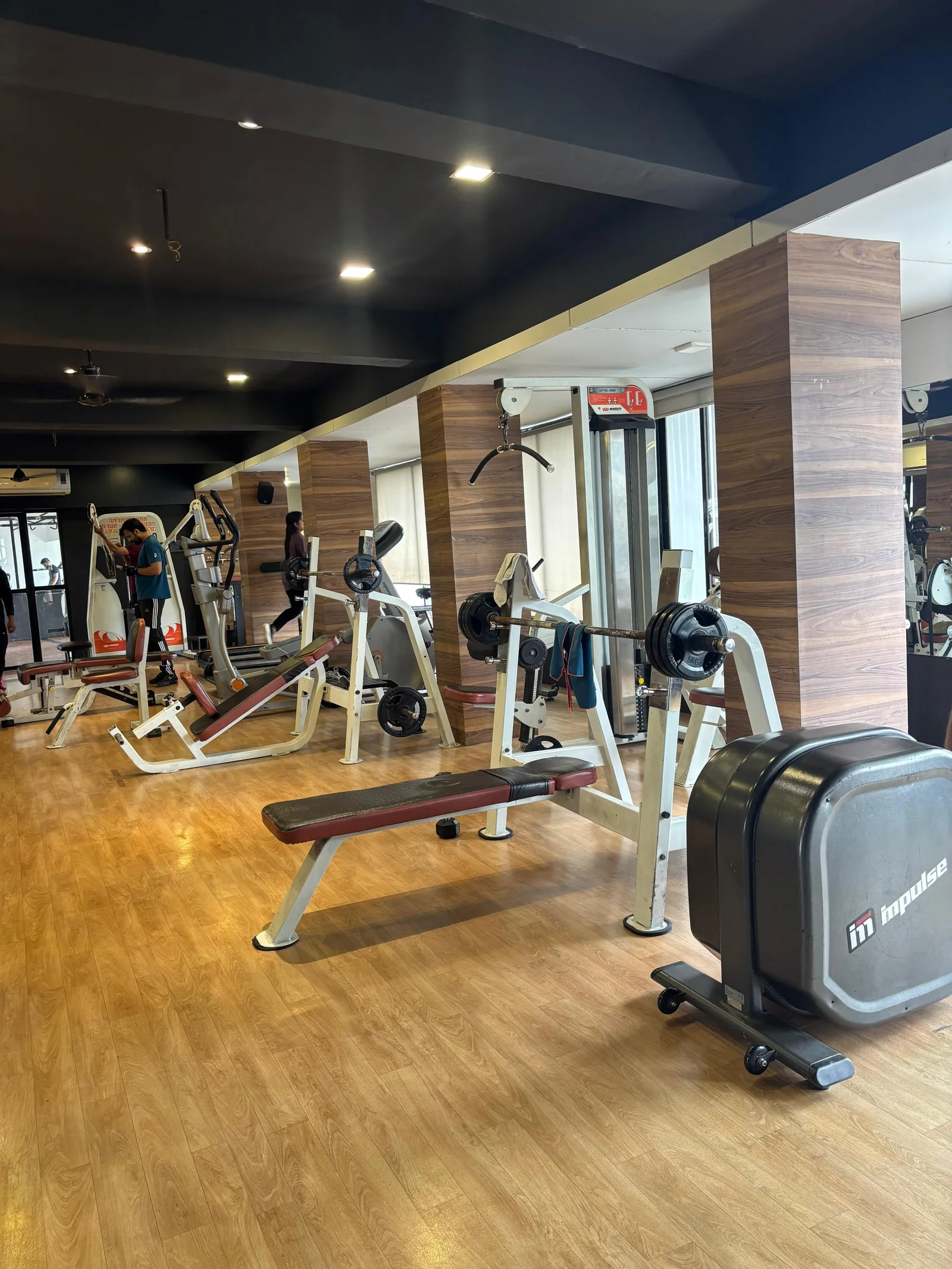 Benches, barbells and the cardio corner at S R Gym Adajan, Surat